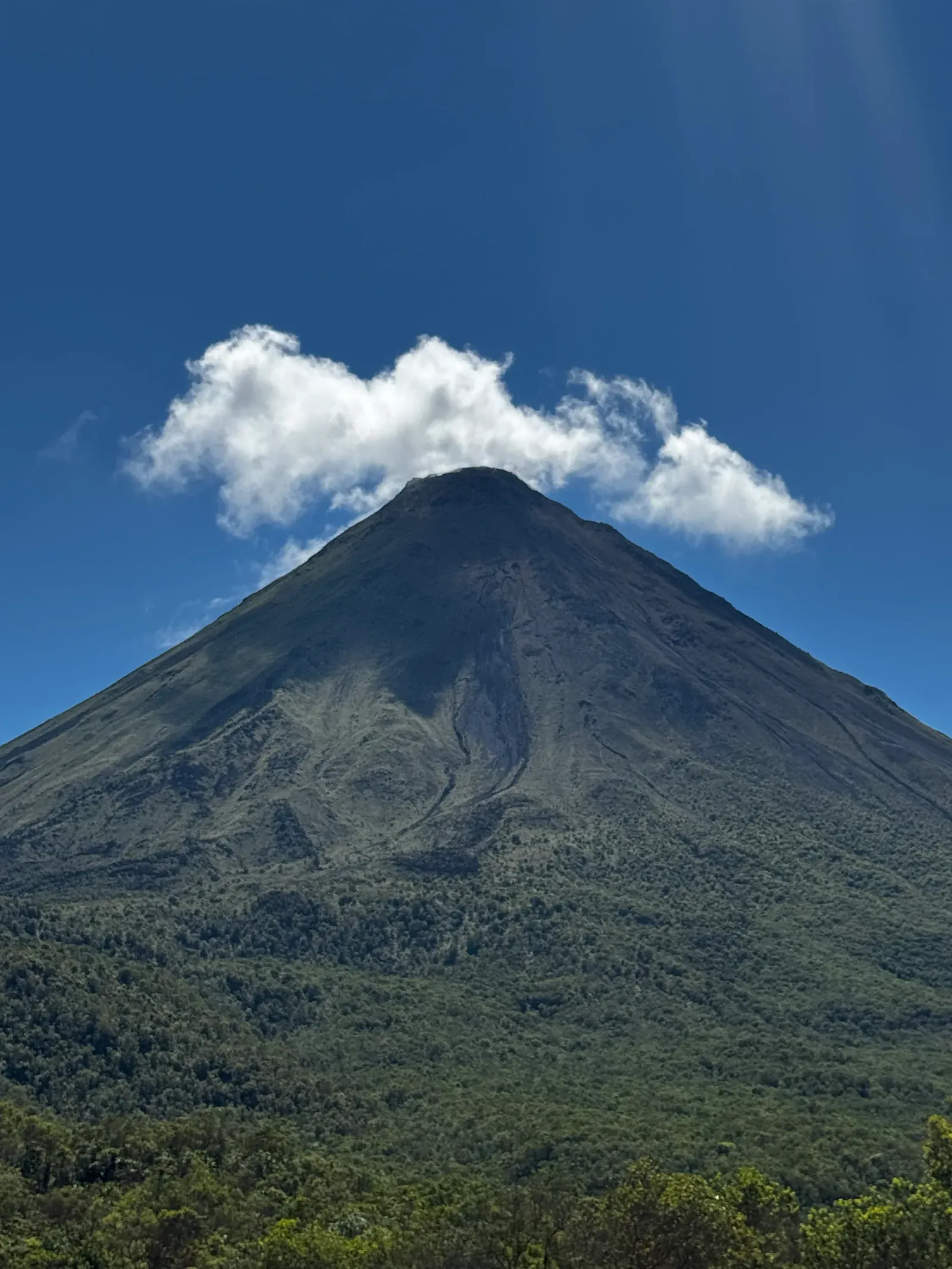 Arenal Volcano above the rainforest